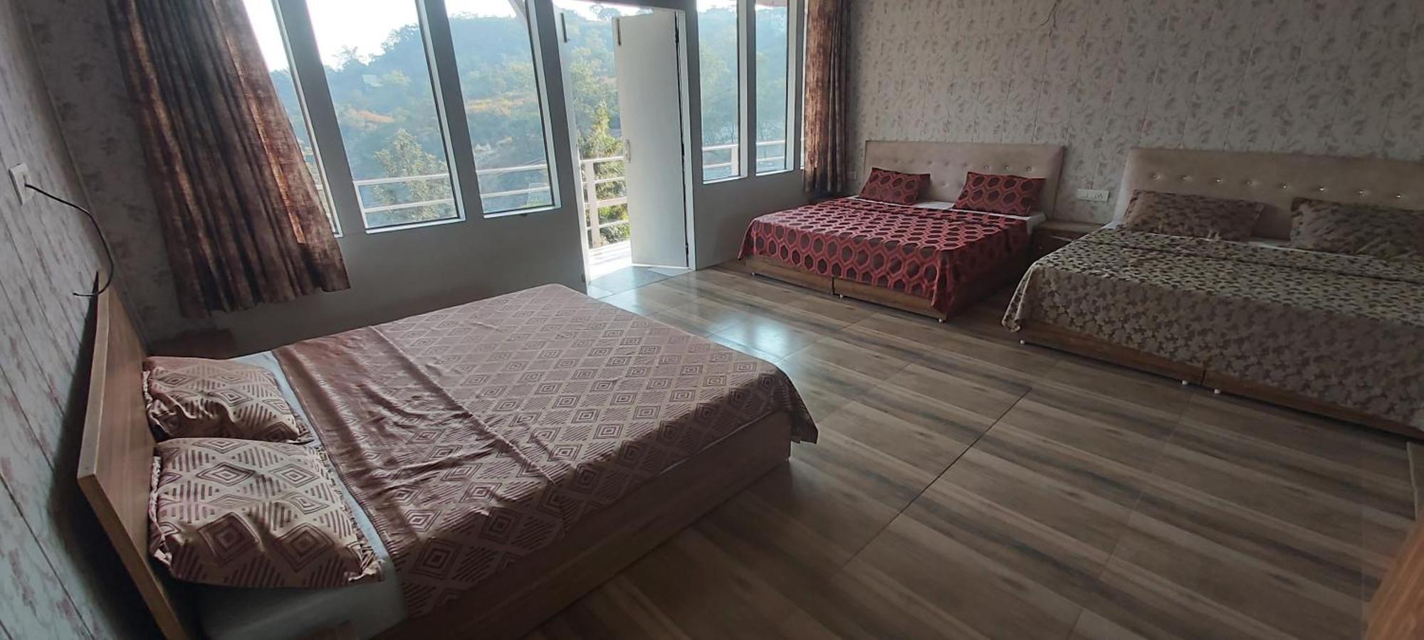 Valley Retreat Home Stay Déhrádún Pokoj fotografie